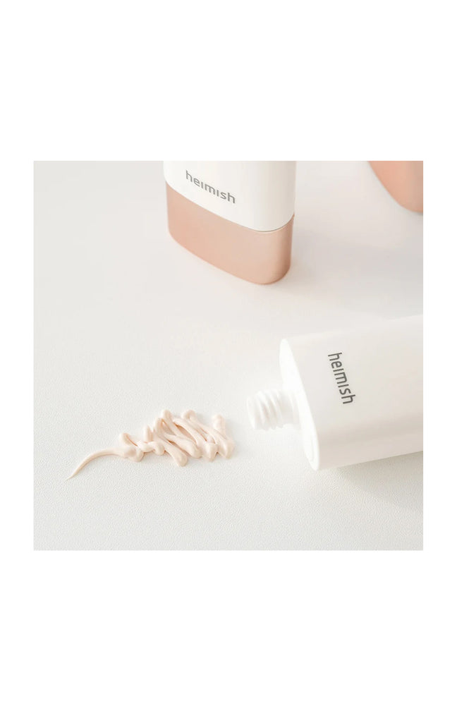 Base de teint éclat SPF 50+ - Artless