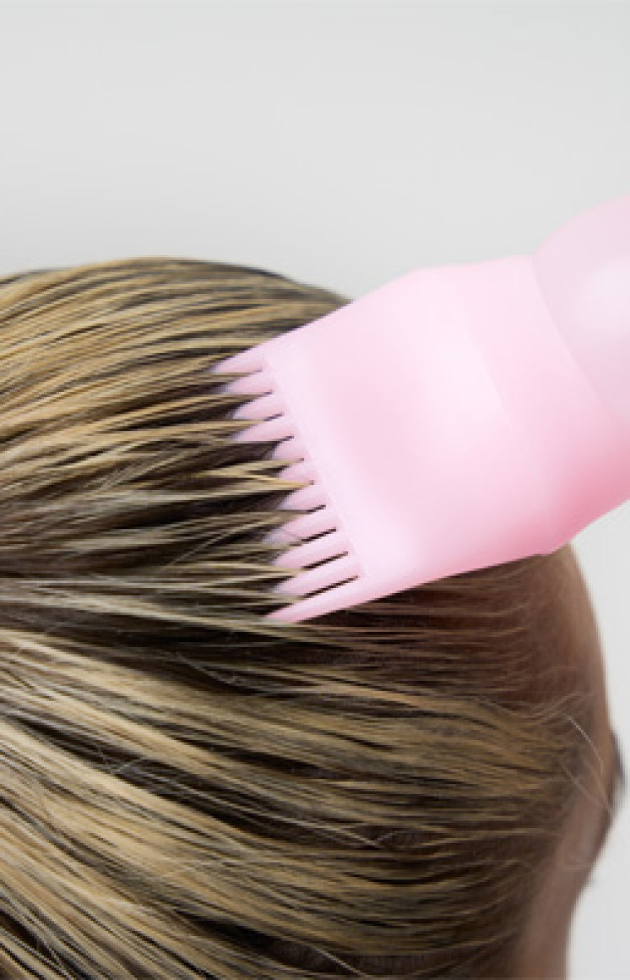 Applicateur de soins capillaires