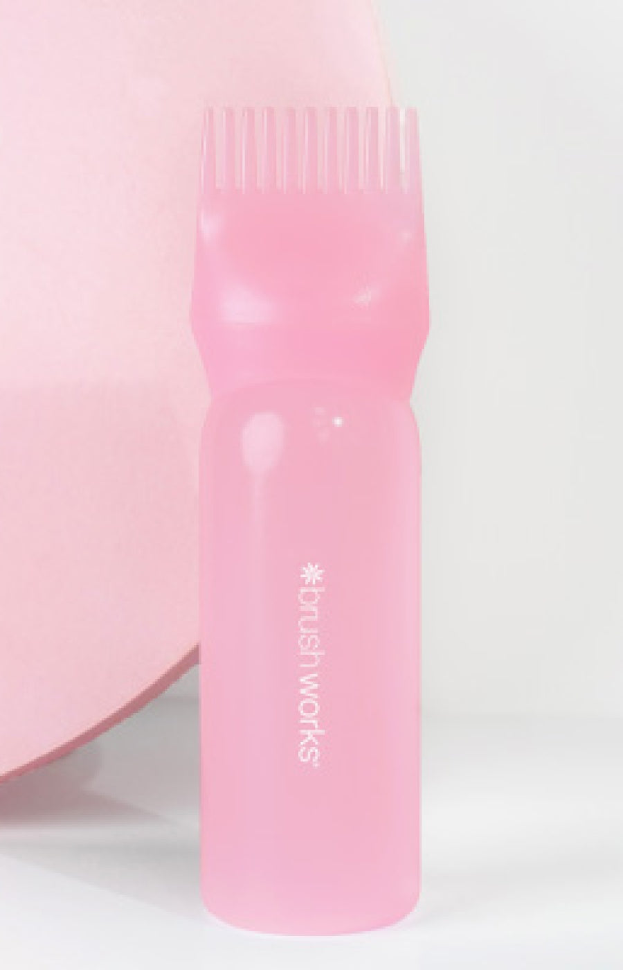 Applicateur de soins capillaires
