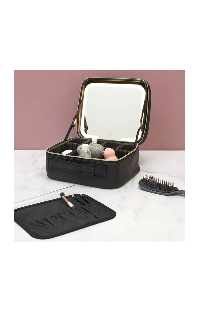 Trousse a maquillage avec miroir LED