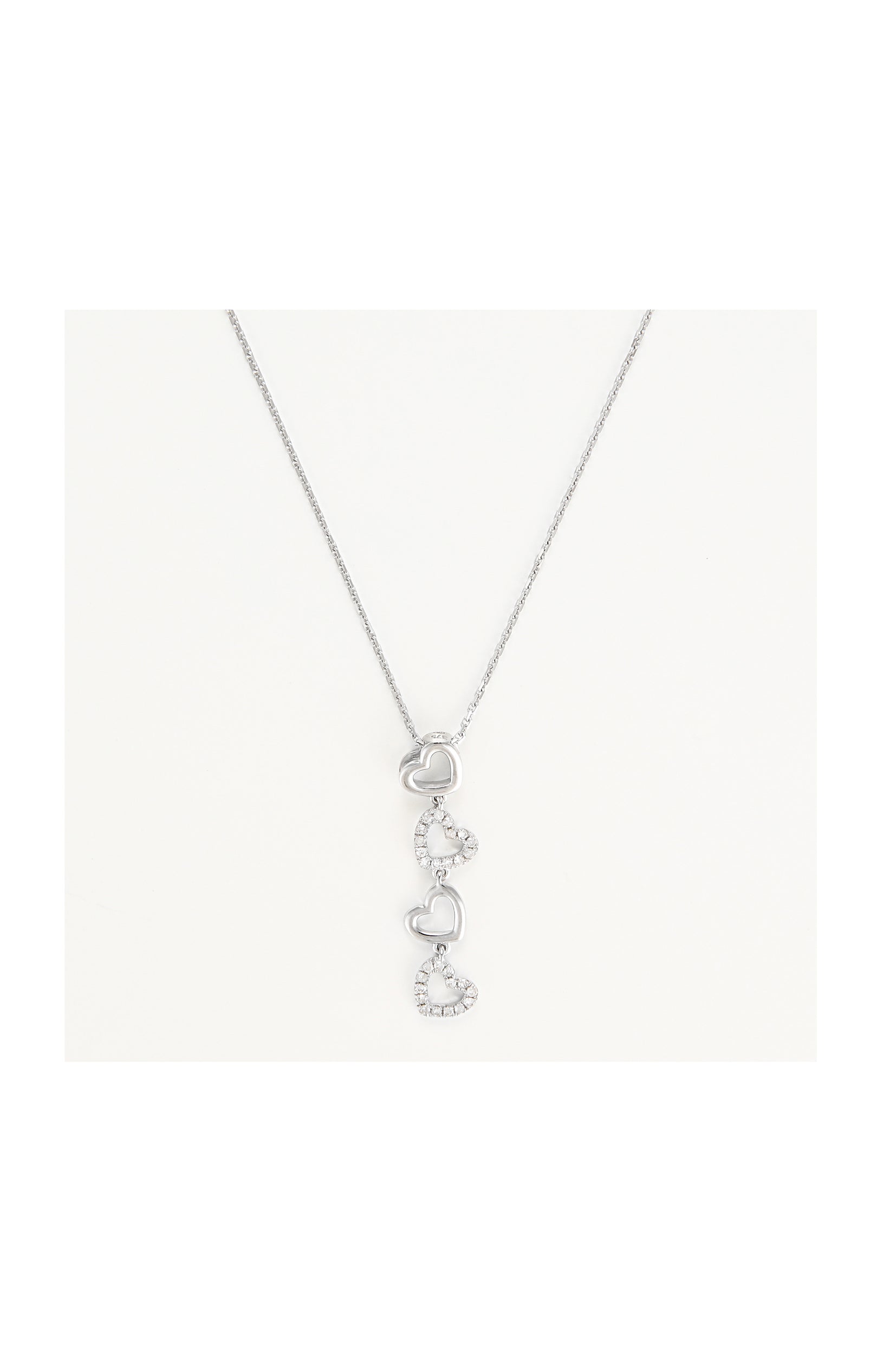 Pendentif 4 cœurs – Or blanc 375/1000 & diamant