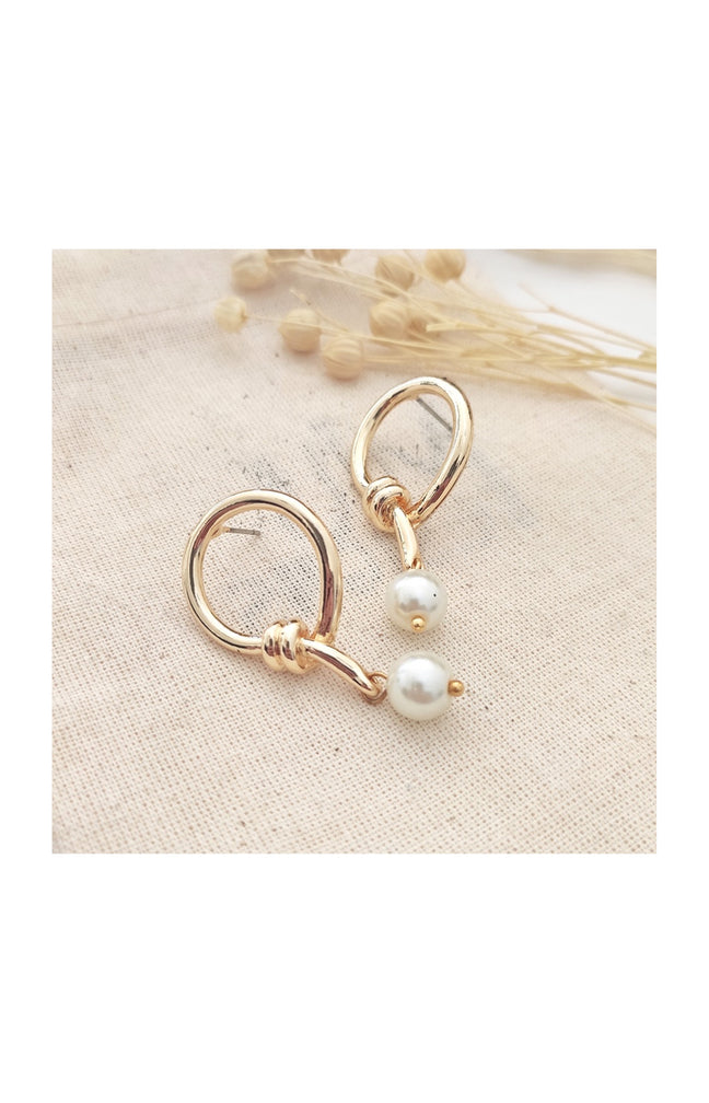 Boucles d’oreilles dorées à l’or jaune