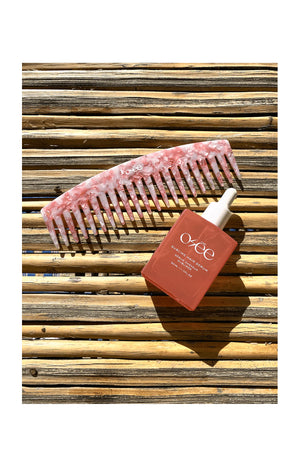 Peigne marbré à dents larges – Rose